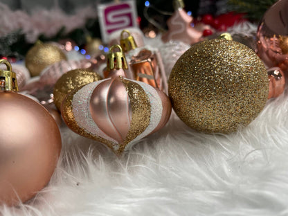 Set globuri si decoratiuni de Craciun, 77 piese, diverse dimensiuni, roz auriu